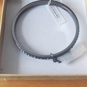 Coach Dark Gray Bangle Bracelet With Deep Blue Crystals.